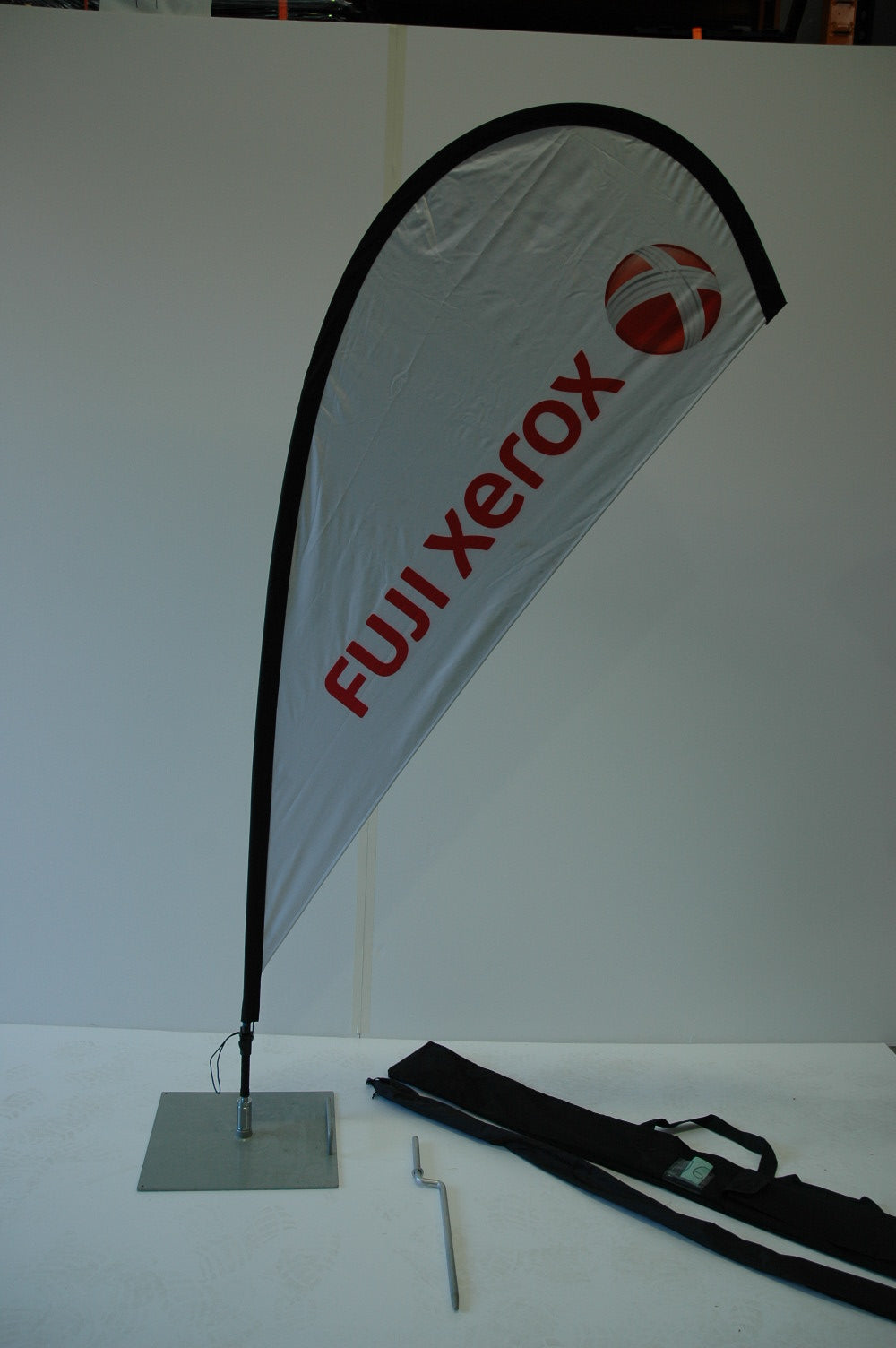 Small flag with hardware & ground spike.