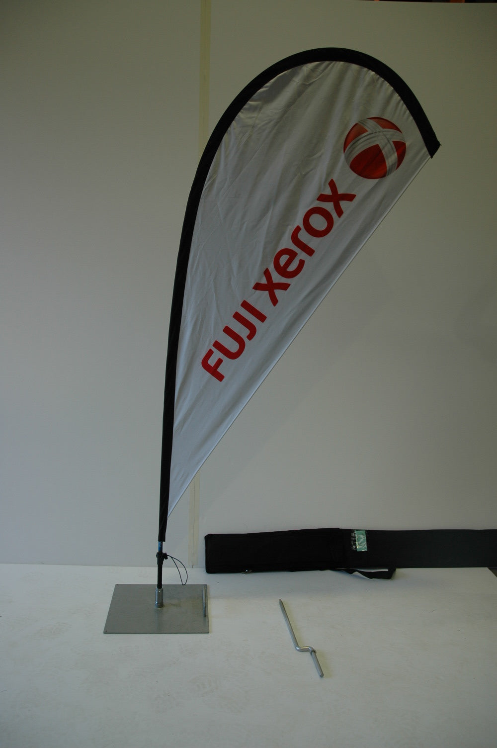 Small flag with hardware & ground spike.