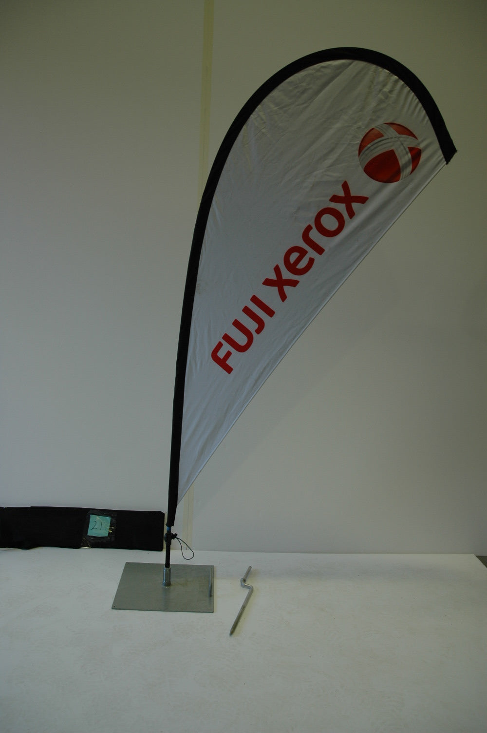 Small flag with hardware & ground spike.